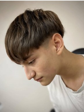 Cliente con corte texturizado y fade